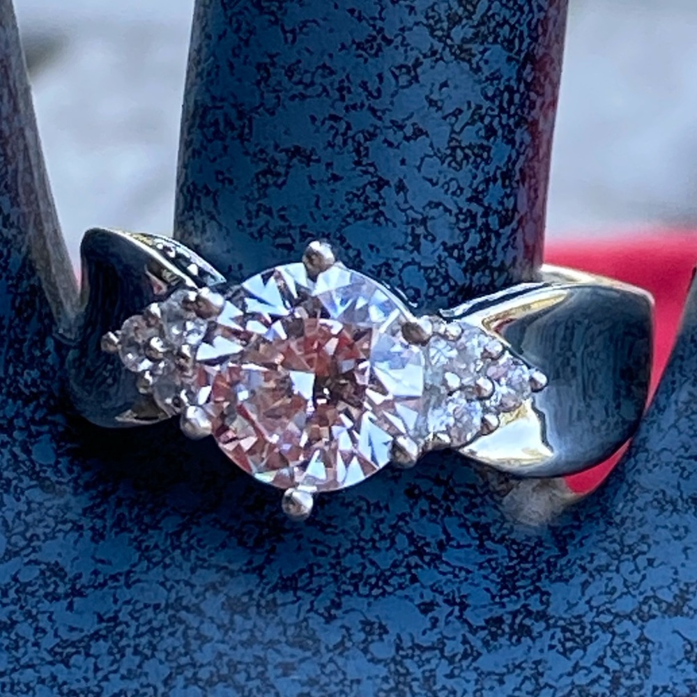 Size 8.5 .925 sterling silver AAA CZ ring.